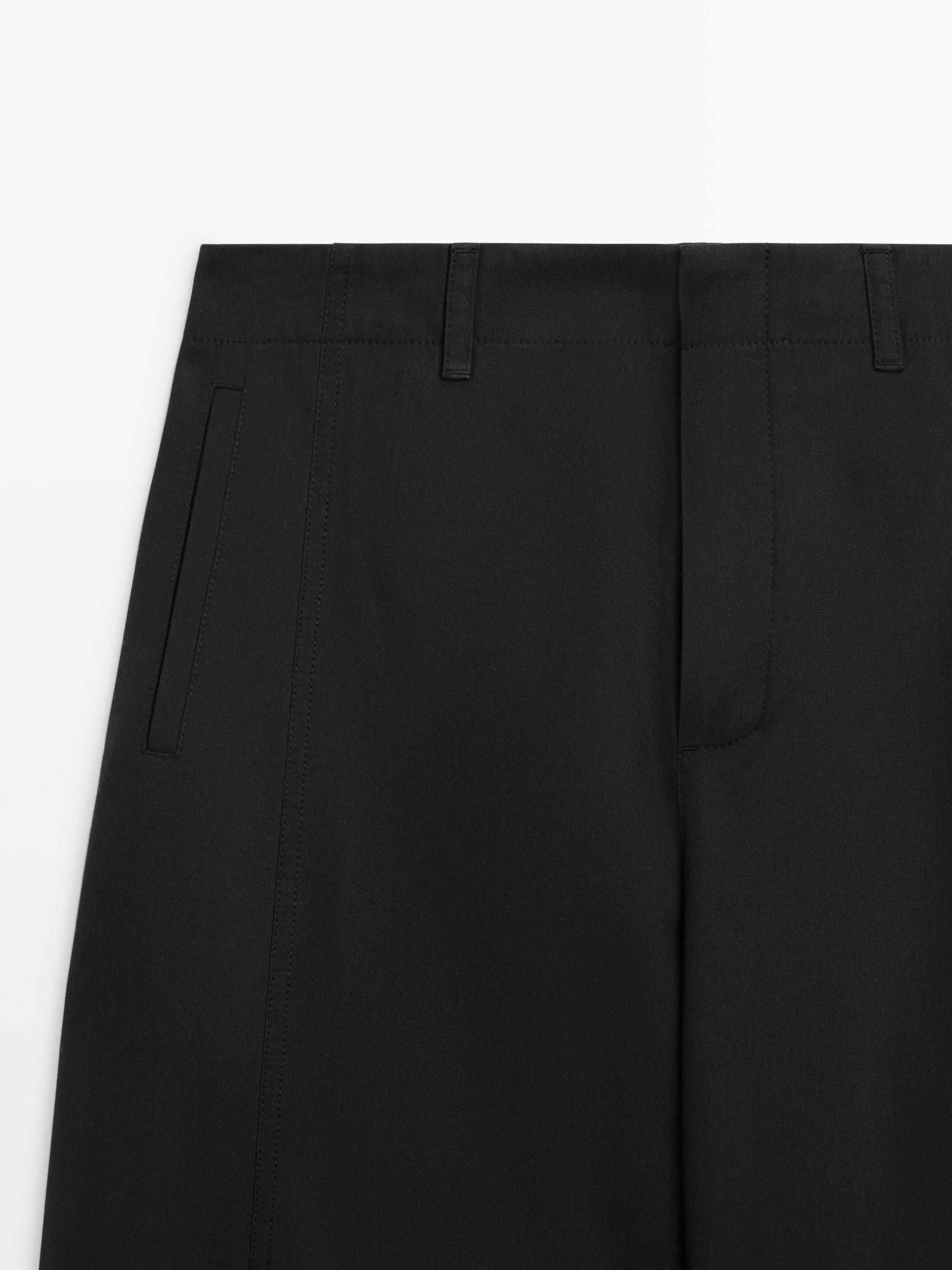 Cotton blend trousers with hem detail